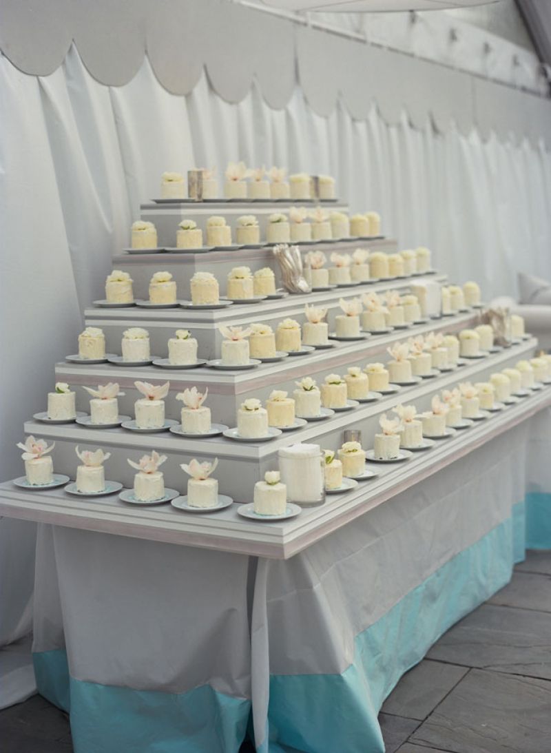SWEET SWEETS: The mini cakes by A Matter of Taste were topped with real flowers and arranged on a soft gray display. Says Sara of the dessert spread, “I saw the idea in Vogue and thought it was adorable.”