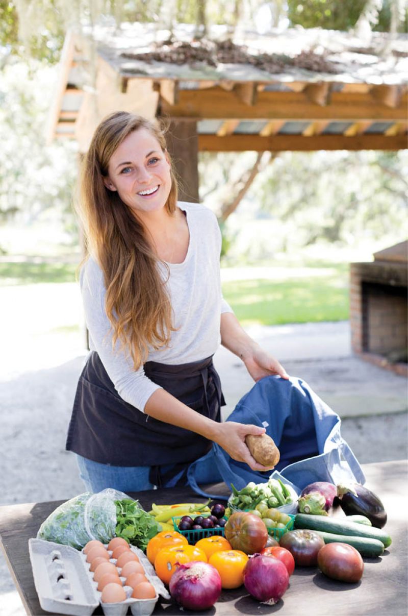 To Market: Candice Broyles manages the neighborhood’s CSA program, for which property owners and other local neighbors can pay for seasonal or weekly shares. Bags full of freshly harvested produce and eggs are delivered every Wednesday