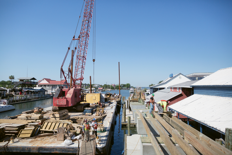 The town-funded construction of public walkways along the northwestern shore.