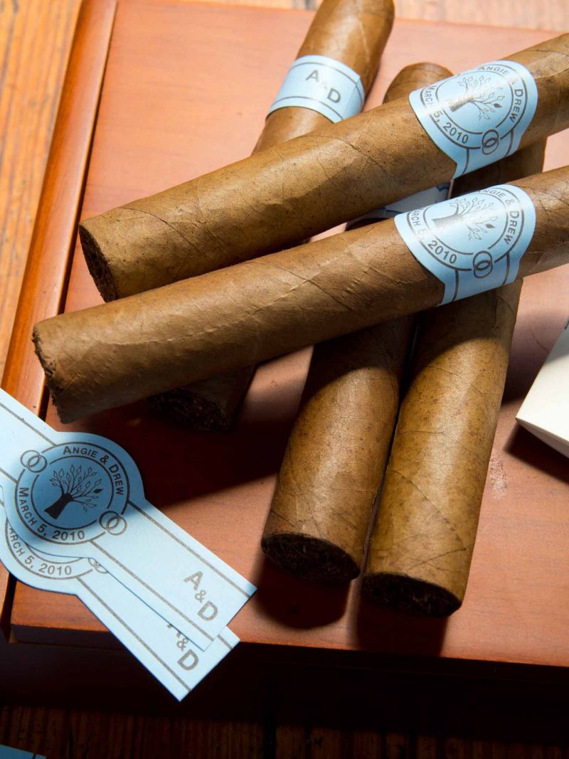 ON A ROLL: Hand-rolled cigars with custom bands from Coastal Cigars.