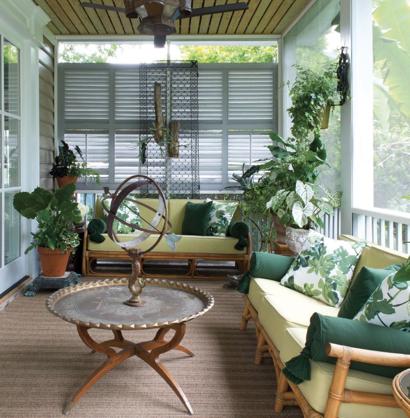 With its grass matting, bamboo furniture, and lush surroundings, this newly constructed screened porch combines the architectural clarity of the Federal-era dwelling it appends with the breeziness of a South Asian veranda.