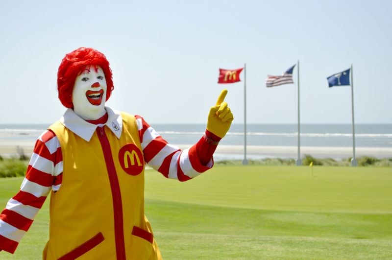 Ronald McDonald pointed out the McDonald’s flag flying over the course for the day.