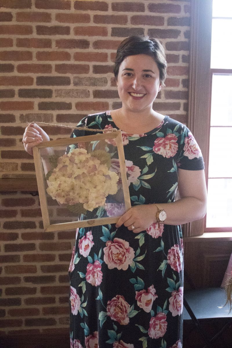 Lauren Whiteside Mann of Southern Bloom Press shows off her masterpiece.