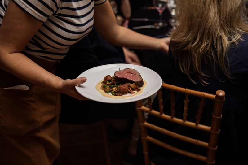 Seared beef tenderloin with sweet potatoes, oyster mushrooms, peas, and brown butter hollandaise by Will Fincher of The Obstinate Daughter and Wild Olive.