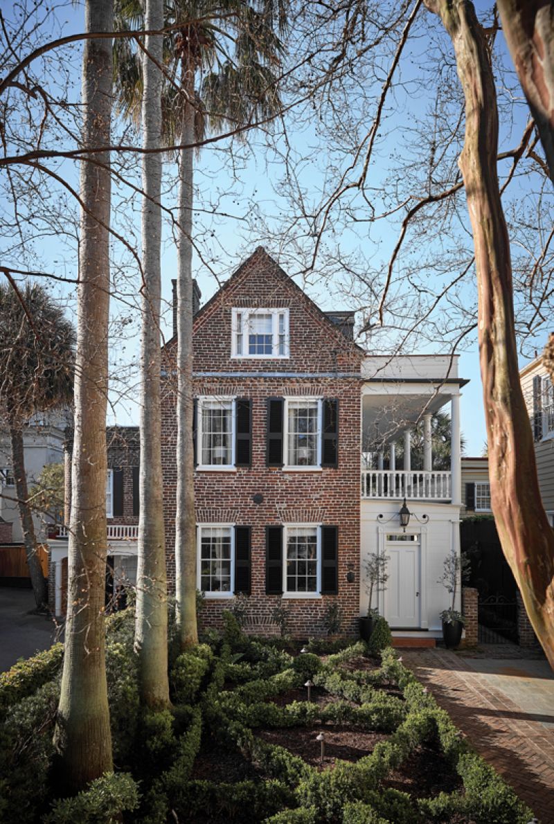 A Stately Single: Built in the late 18th century, this two-and-a-half-story brick house on Tradd Street is a classic example of Federalist-style architecture.