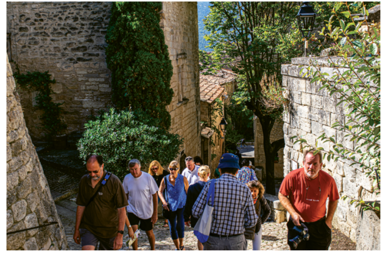 Enjoying the climb in the hilltop village of Bonnieux, France