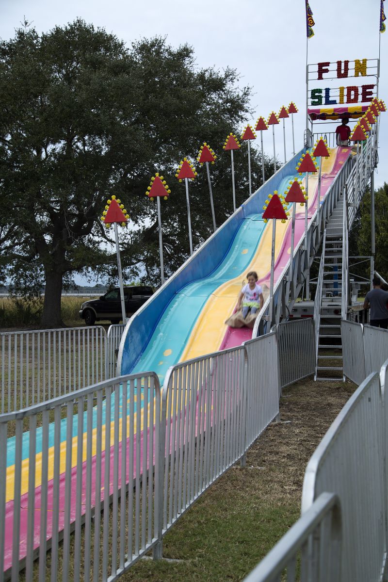 The fun slide was a popular attraction for the crowd.