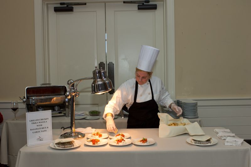 Delicious heavy hors d&#039;oeuvres included grilled chicken tikka masala with basmati rice and garlic naan.