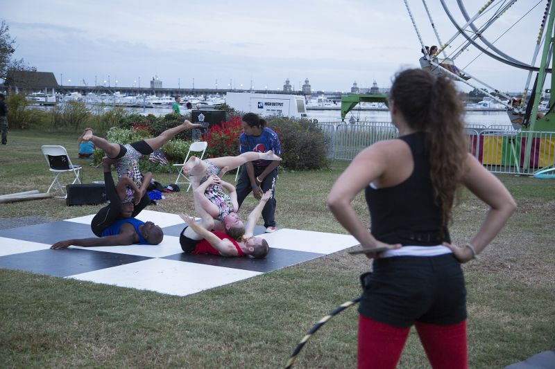 Acro Yoga Charleston&#039;s performance attracted a sizable crowd.
