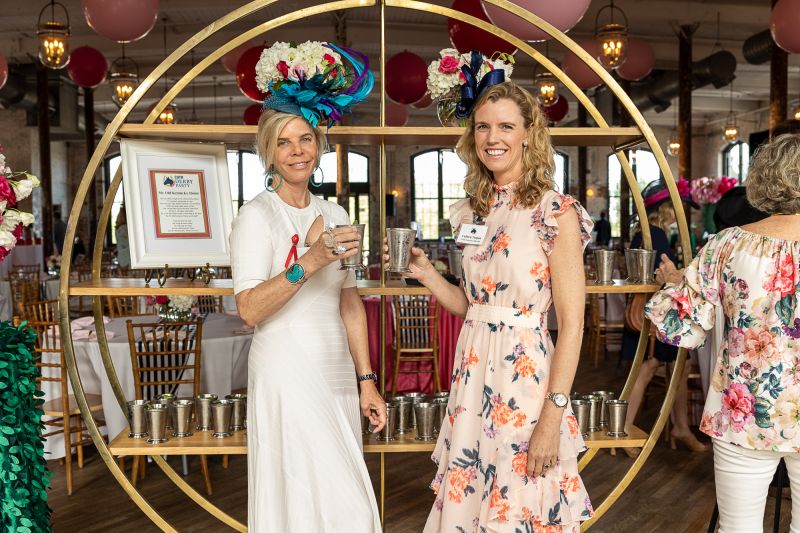 Derby Party committee member Melanie Birch and CATR executive director Colleen Trepen greeted  guests at the door of The Cedar Room.