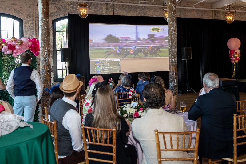 Partygoers took a seat to watch the 2023 Kentucky Derby.