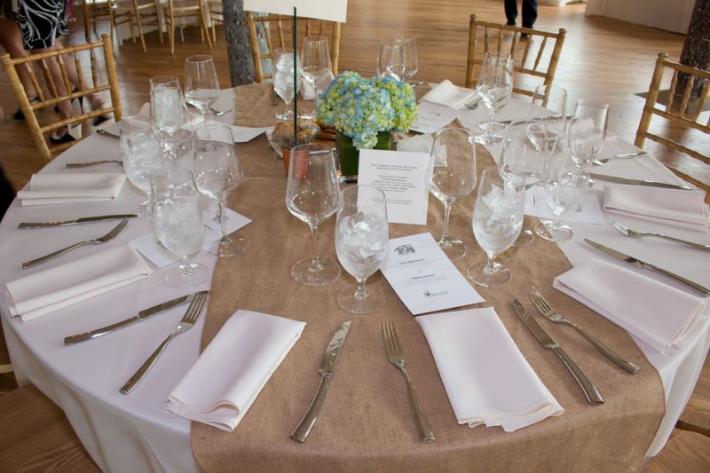 The elegant table settings were set off with colorful hydrangeas.