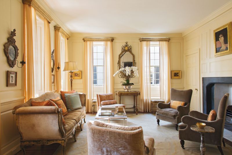 Morning Light: A 1968 portrait by French painter André Minaux sets the tone for the first-floor drawing room. “She has that little bit of pink,” says Ann. “We put her right over the classical Georgian fireplace and suddenly the room got very feminine.” Sketches by Ben Long and two still lifes by Jill Hooper round out the room’s luxe vibe.