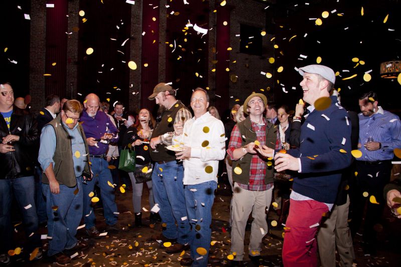 Partygoers doused in confetti