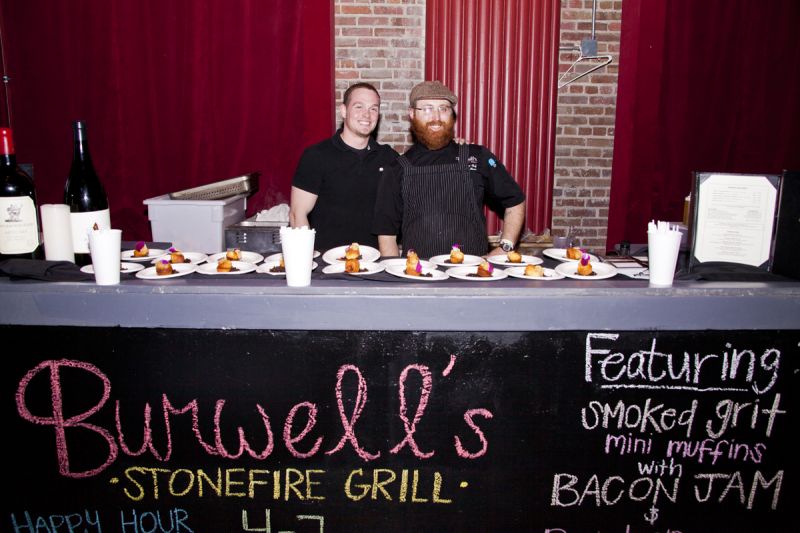 Jordan Moore and Zach Simchak handed out smoked grit mini-muffins with bacon jam and a bourbon butter cream from Burwell&#039;s.