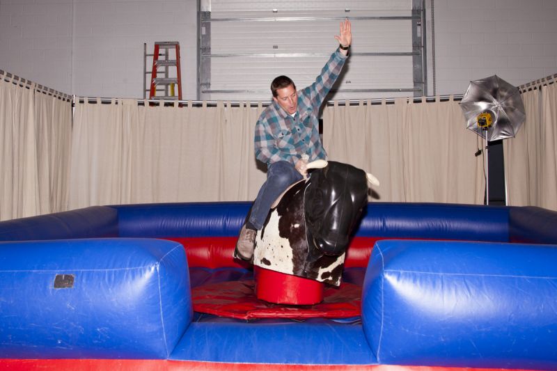 A brave soul took a ride on the mechanical bull provided by BOOTJACK.