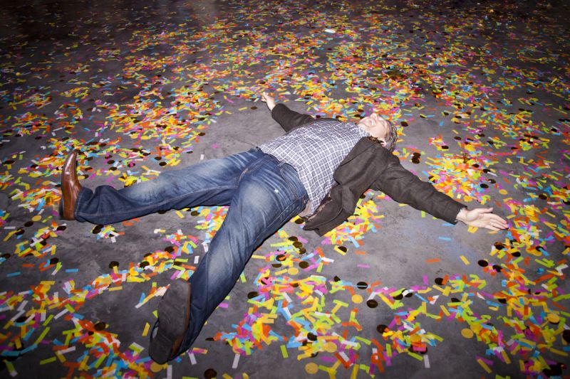 An ecstatic attendee celebrated the night&#039;s success with a confetti angel.