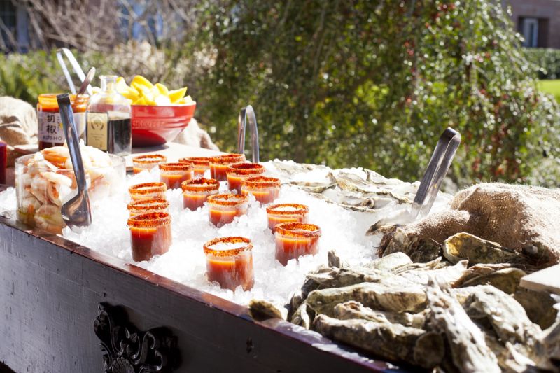 Ace blades, pickled shrimp, hot sauces, and oyster shooters