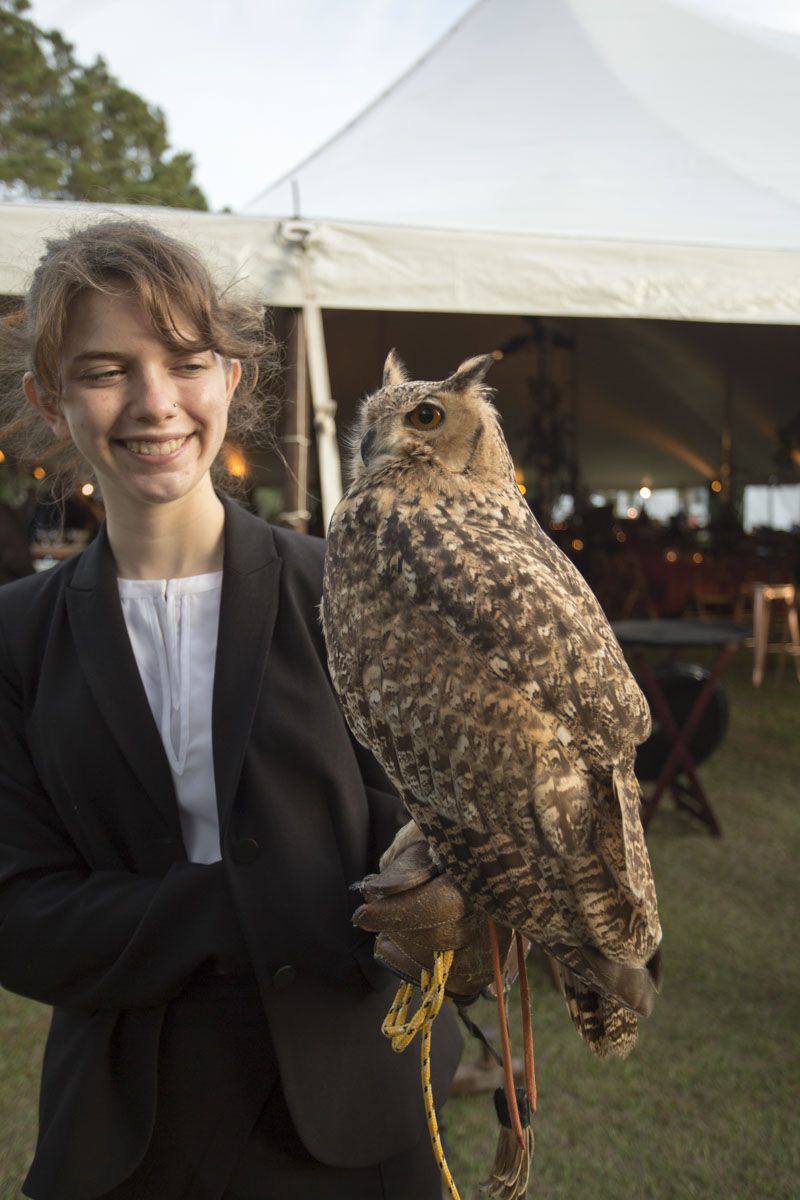 A volunteer with the Center’s resident eagle owl