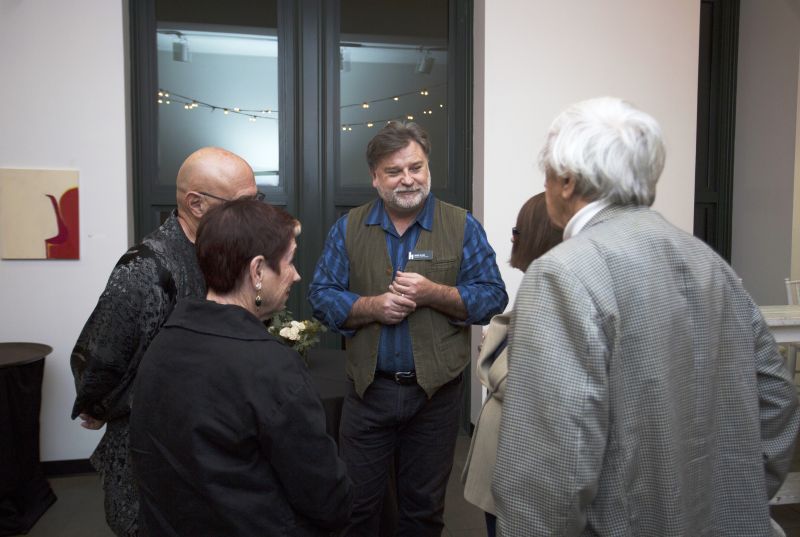 Halsey director and chief curator Mark Sloan chatting with guests