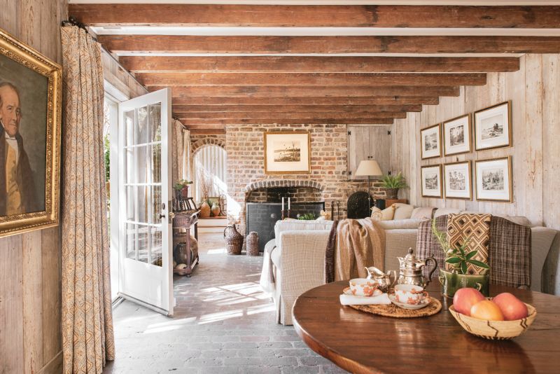 This family room and breakfast area are within what was once a separate kitchen house; a previous owner had the rear building connected to the main structure via a hyphen.