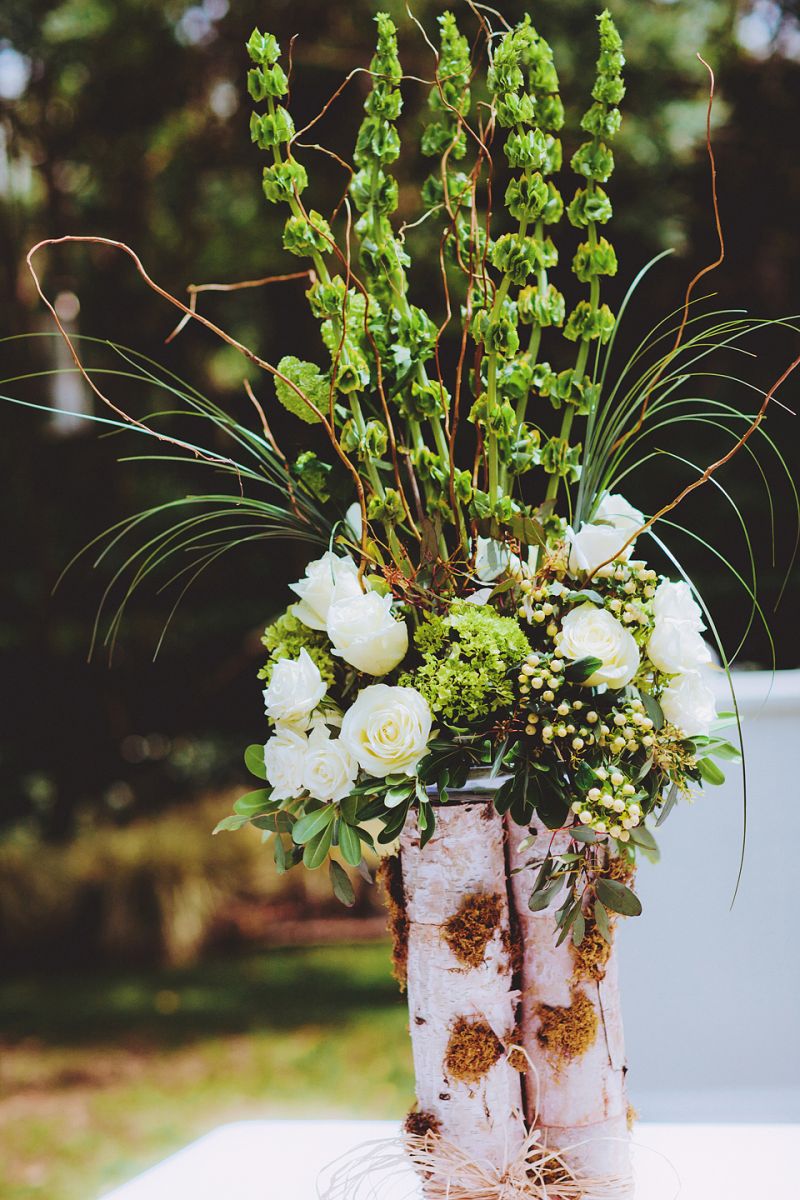 NATURAL BEAUTY: “We went simple—white with green accents,” says Allison of the florals.