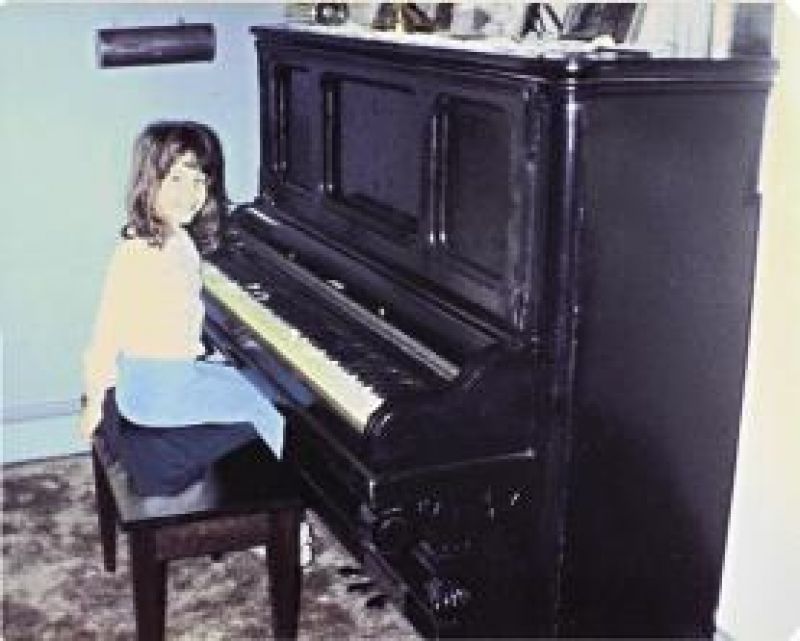 Born to Perform: An eight-year-old Elise playing at home in Kinnelon, New Jersey