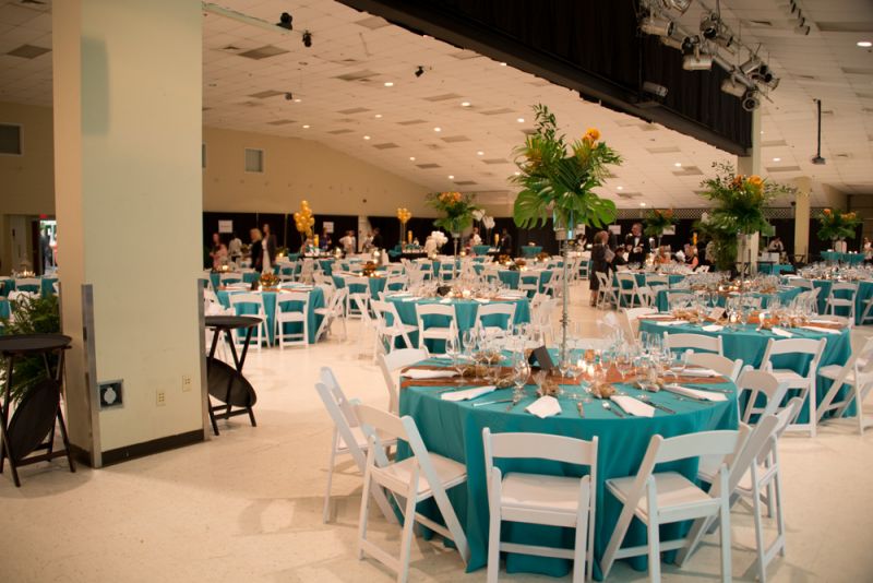 Tables adorned in the turquoise and yellow colors of the East Cooper Meals On Wheels sat ready for a fun-filled evening.