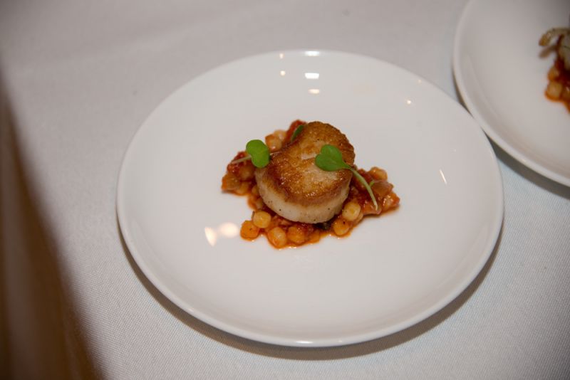The Obstinate Daughter plated up seared scallops over fregola and nduja stew.