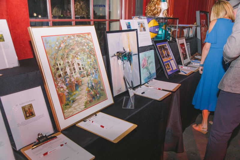Proceeds from auction items, including pieces of artwork by Helen Thorne, support Camp Happy Days in providing free year-round programming and access to crisis resources to families of children diagnosed with cancer.