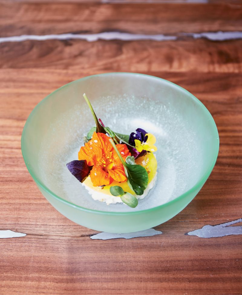 At McCrady’s Counter, stunningly plated dishes with edible flowers, exotic greens, heirloom grains and proteins, and whimsical desserts are included in the menu set nightly by Sean Brock.