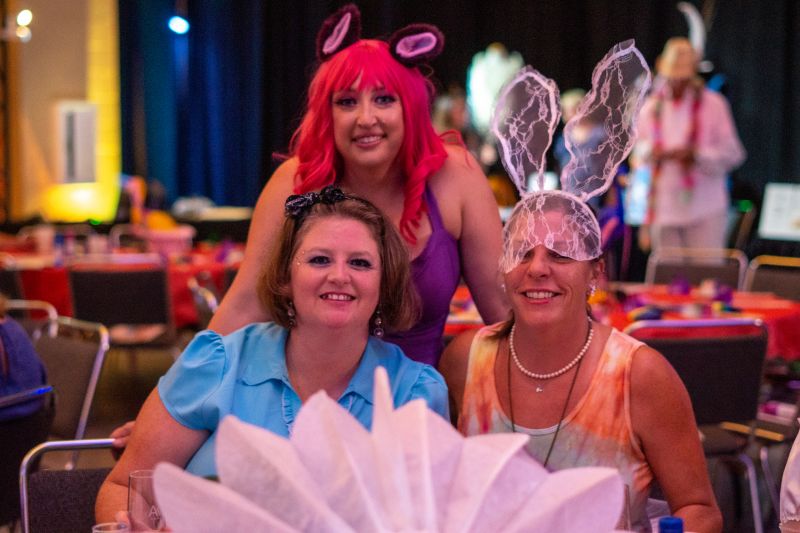 Amy Morley, Lacy Sherrill, and Susan Ash in their “Alice in Wonderland” costumes.