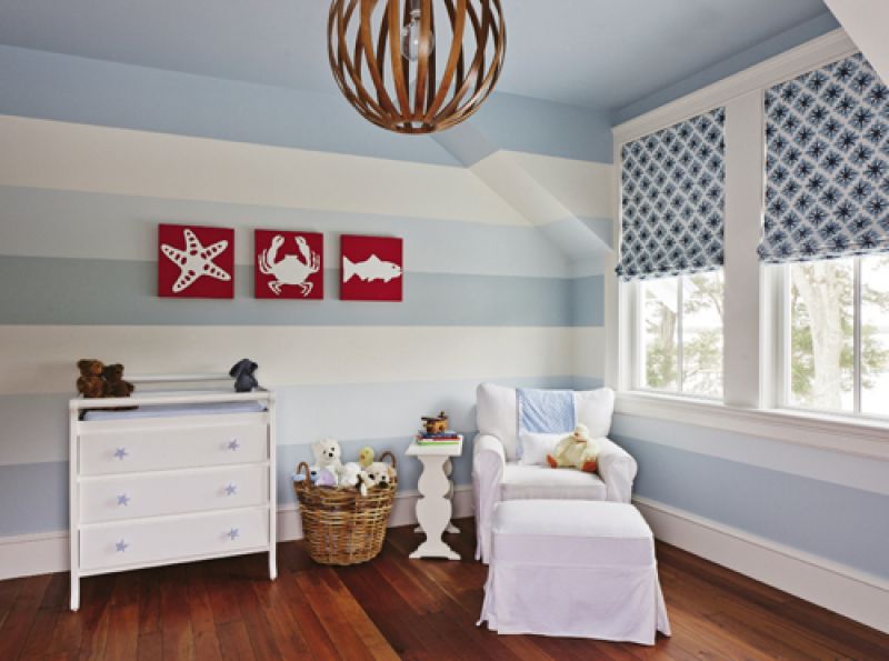 A more streamlined palette of coastal hues strikes a soothing tone in his nursery.