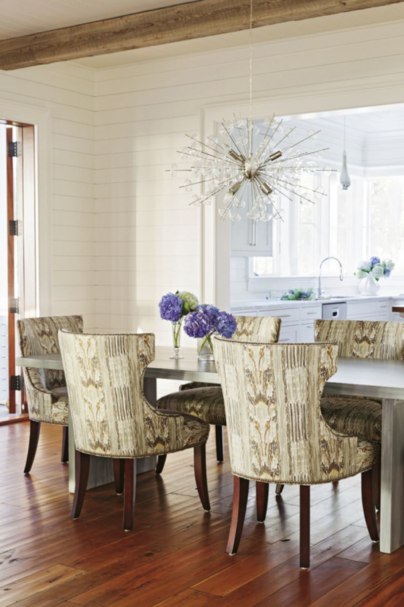The Clarence House fabric on these chairs is eye-catching and practical, as  it disguises stains.