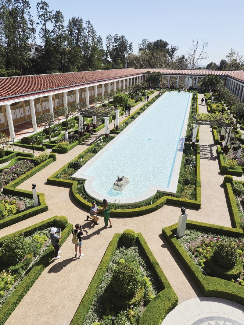 While touring the Getty Villa’s classic architecture and galleries, a man suddenly kneels and proposes by the reflecting pool. Onlookers cheered and clapped.