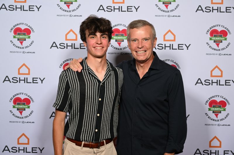 “NFL on Fox” broadcaster Tom Rinaldi (right) posed with his son, Jack during the HEARTest Yard Celebrity Classic.