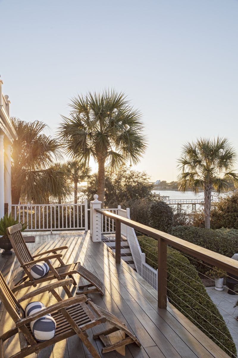 Peggy’s favorite are the muted greens and blues of the early evening, when she loves to take in spectacular sunsets from their deck overlooking a swimming pool and deep-water dock.