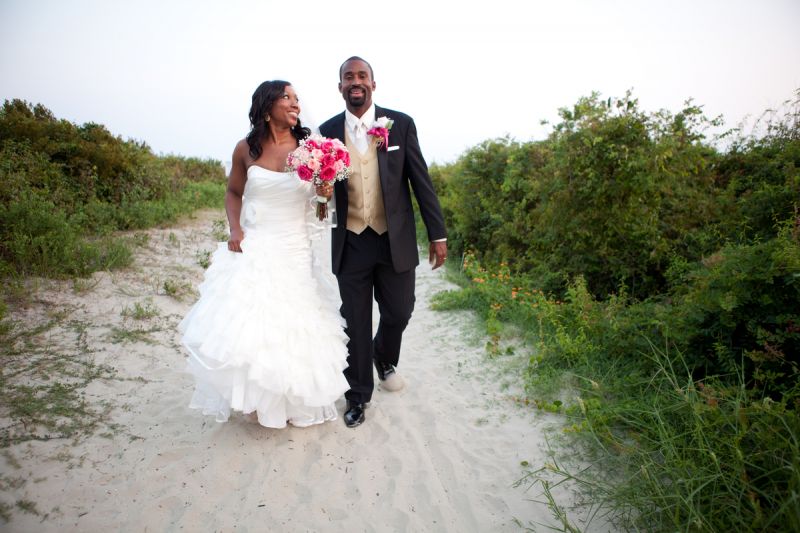 SURE OF THE SHORE: The couple says choosing the reception venue was simple: “We both love the beach, with the bride being raised in Charleston and the groom being of Jamaican ancestry, it was only fitting that we had a venue on the water,” says Marissa. “The Sand Dunes Club is one of the best beach venues in the Charleston area.”