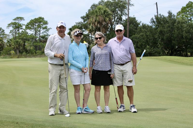 Cartter and George Lupton with John and Connor Gantt took to the green in support of nonprofit First Tee Greater Charleston.