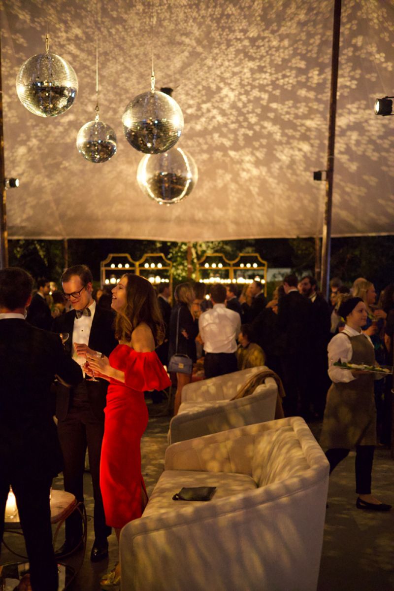 Guests mingled under disco balls in the Gibbes Museum of Art’s Lenhardt Garden.