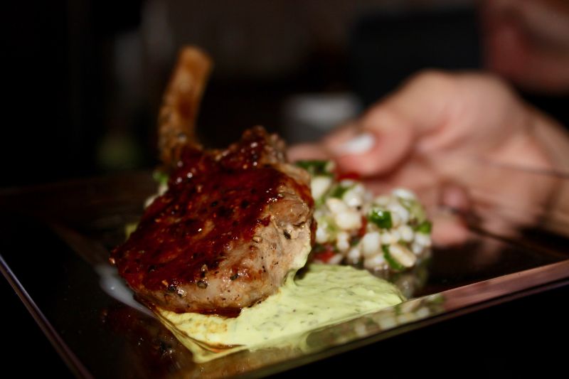 Halls Chophouse and Slightly North of Broad chef Matthew Niessner served lamb chops over pearled barley tabbouleh toast with a chimichurri aioli.