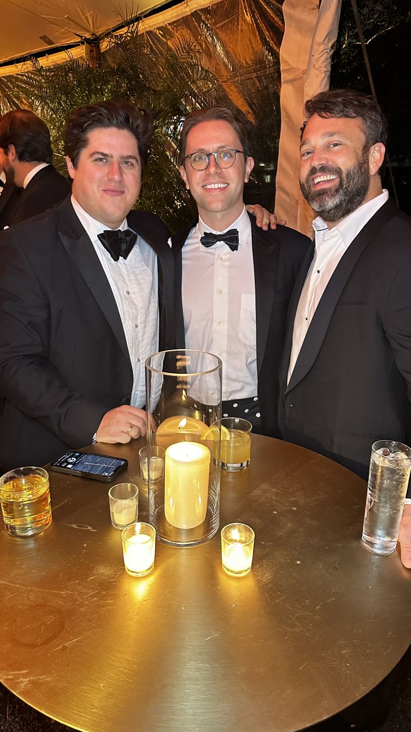 Paul and Will Cannon with John McClain posed for a photo during the Society 1858 Winter Party.