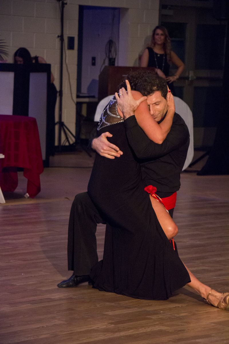 Competitors Artur Malakyan and Nancy Deitch dance the rumba.