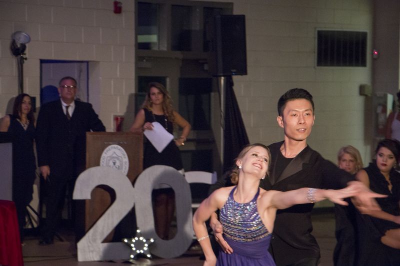 Greer Reagin of Reagin Orthodontics and James Jiang dance the waltz.