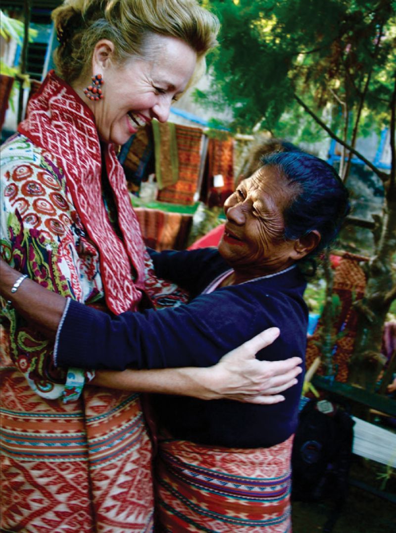 Walker with a weaver in West Timor, Indonesia, in August 2010.
