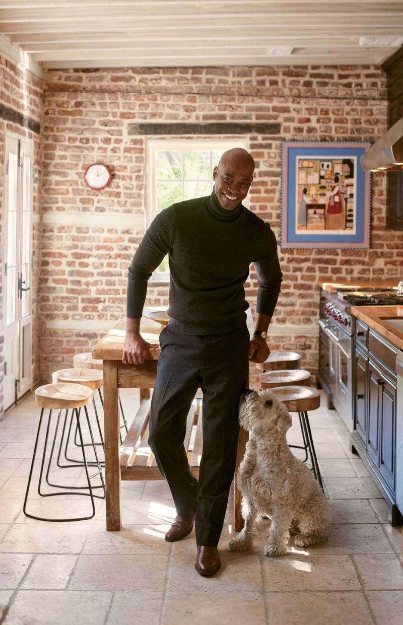 The physician, shown with his pup, Kasey, worked with interior stylist Nathalie Naylor to balance his love of modernism with the home’s traditional architecture.