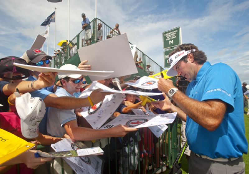 Bubba Watson responded to the chants of Bubba, Bubba...with an extended signing session.