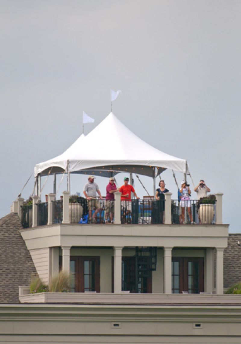 A rooftop gathering with a great view of the 10th hole.
