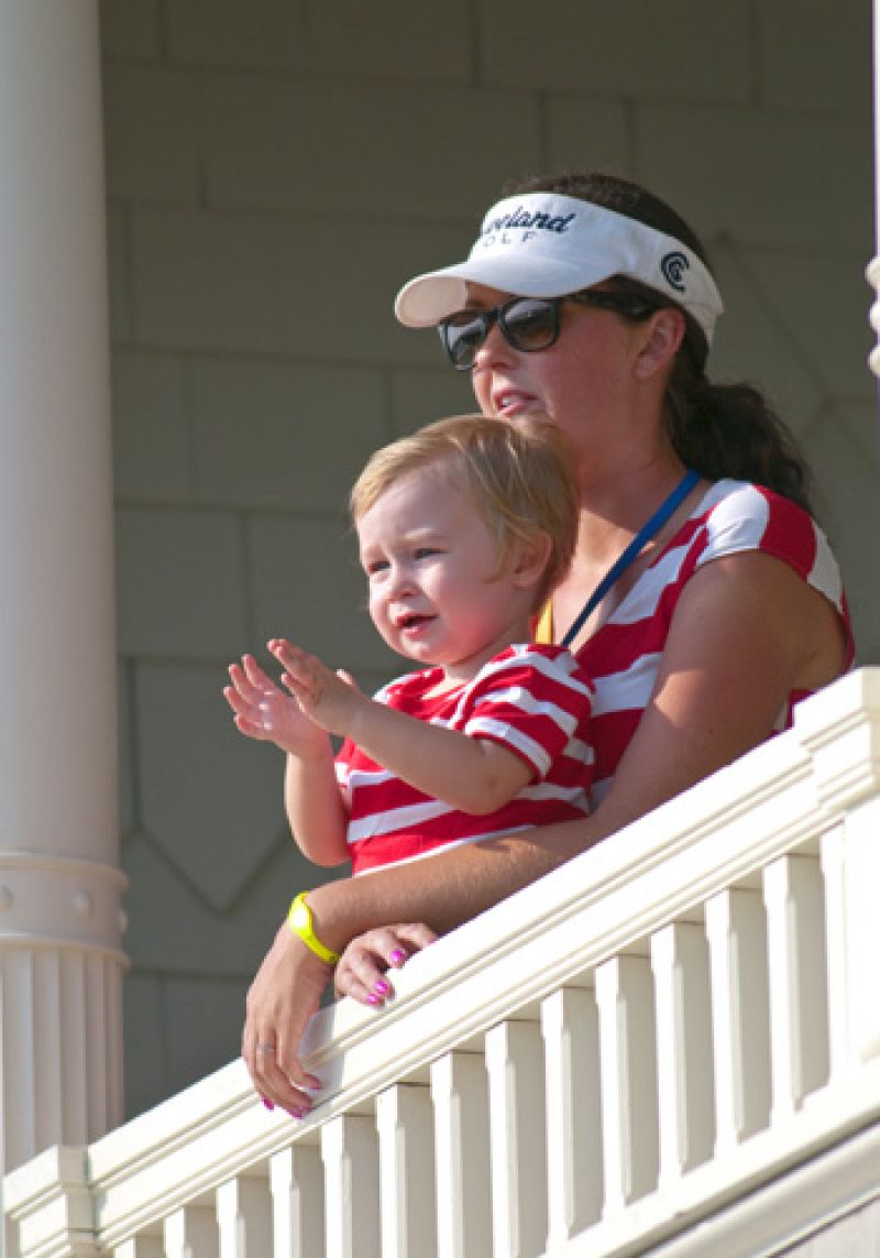 VIPs watching the action on 18 from the clubhouse.