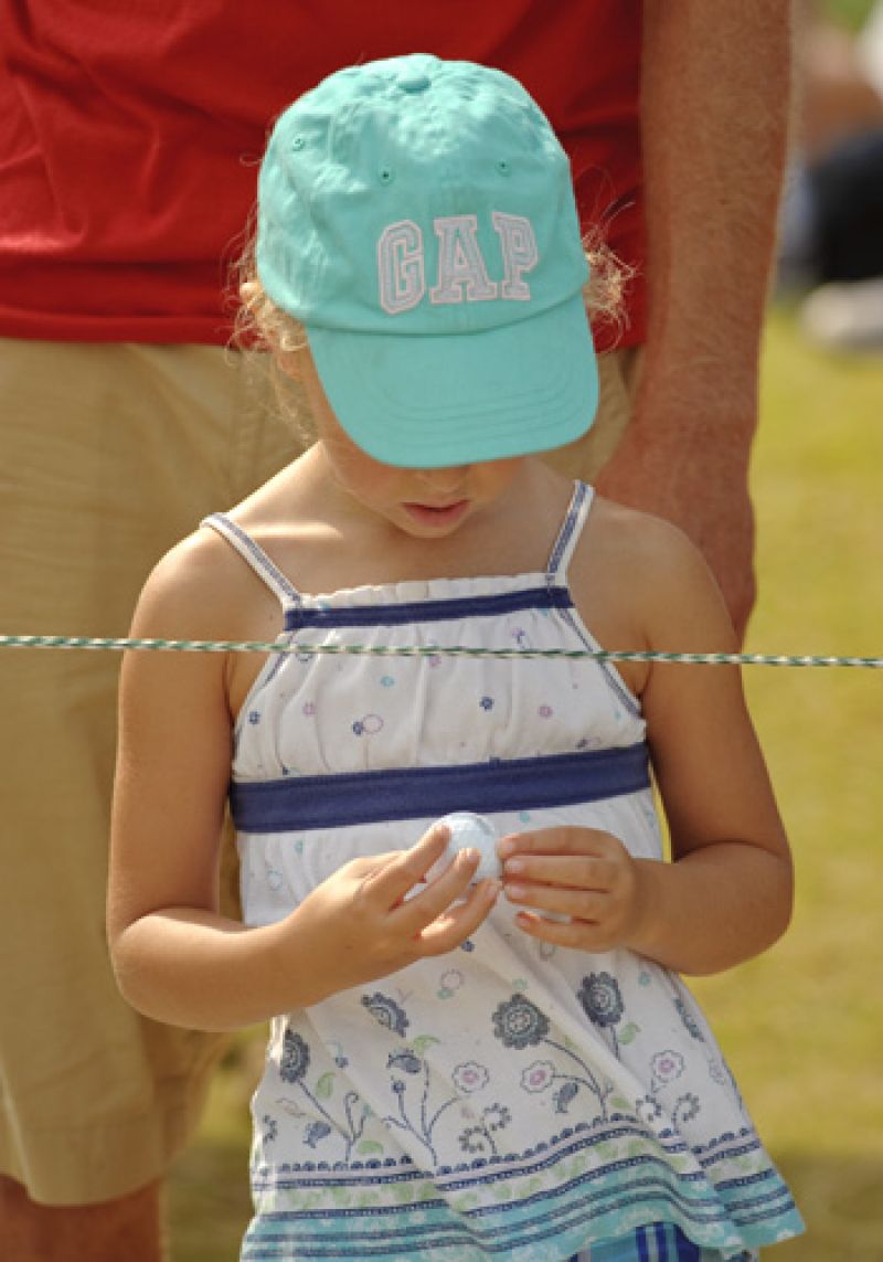 This young fan admires a gift from Louis Oosthuizen.